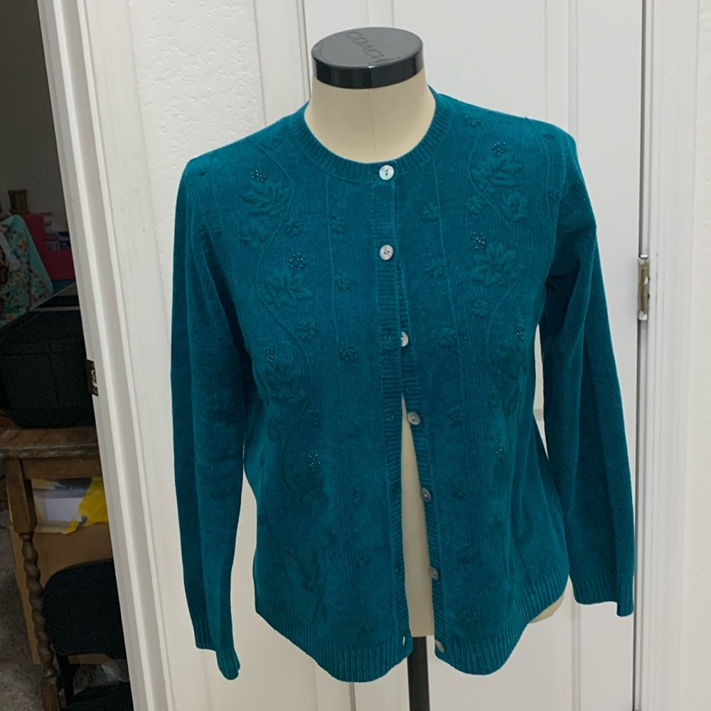 Blue Sweater by Karen Scott.